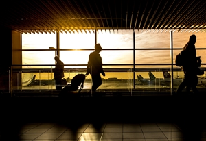 A traveler waiting at an airport.