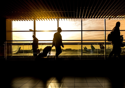A traveler waiting at an airport.
